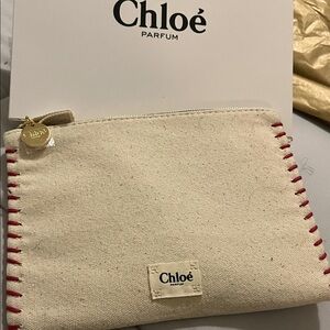 Chloe Cream Cosmetic Bag with Red Stitching